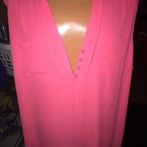 Sleeveless pink top. long top. Covers well